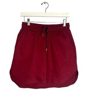 Never a wallflower track skirt maroon Sz m pull on.